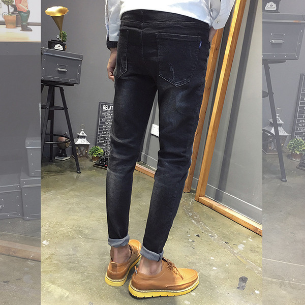 Férfi tavaszi-őszi farmernadrág szakadt motívumokkal