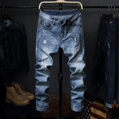 Tavaszi-őszi férfi farmernadrág szakadt motívumokkal