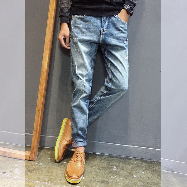 Tavaszi-őszi férfi farmernadrág szakadt motívumokkal