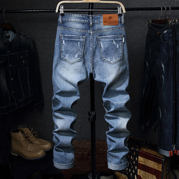 Tavaszi-őszi férfi farmernadrág szakadt motívumokkal