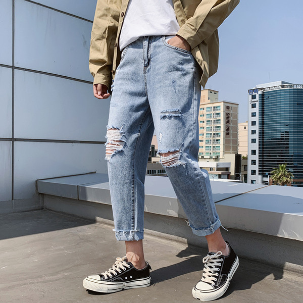 Alkalmi férfi farmernadrág szakadt gumival és zsebekkel