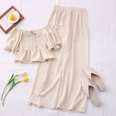 Hétköznapi női szett hosszú nadrágból és rövid blúzból