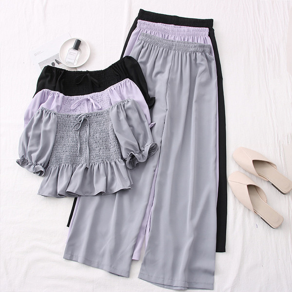 Hétköznapi női szett hosszú nadrágból és rövid blúzból