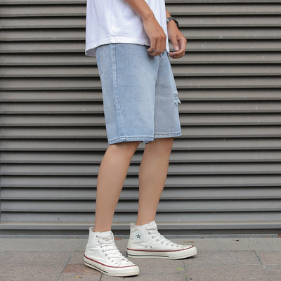 3/4-es férfi farmer, szakadt motívummal, kék színben