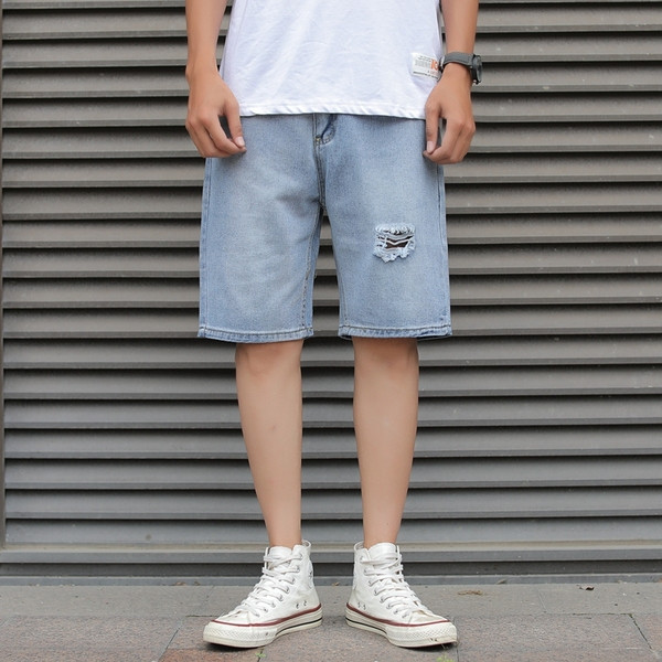 3/4-es férfi farmer, szakadt motívummal, kék színben