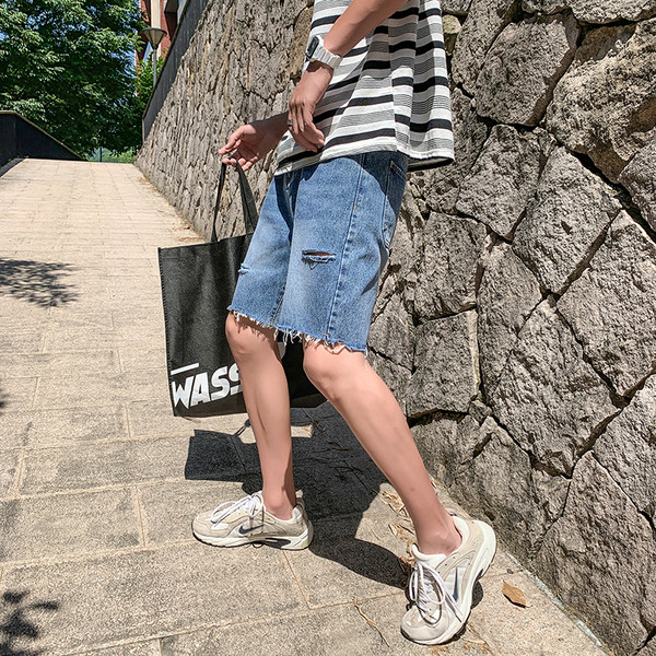 Kék színű, zsebes férfi alkalmi 3/4-es farmernadrág