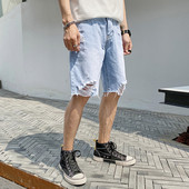 Fájdalmas alkalmi 3/4-es farmer, jobb oldali szakadt kék cipzárral