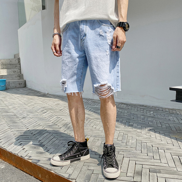 Fájdalmas alkalmi 3/4-es farmer, jobb oldali szakadt kék cipzárral