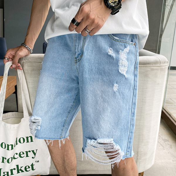 Fájdalmas alkalmi 3/4-es farmer, jobb oldali szakadt kék cipzárral