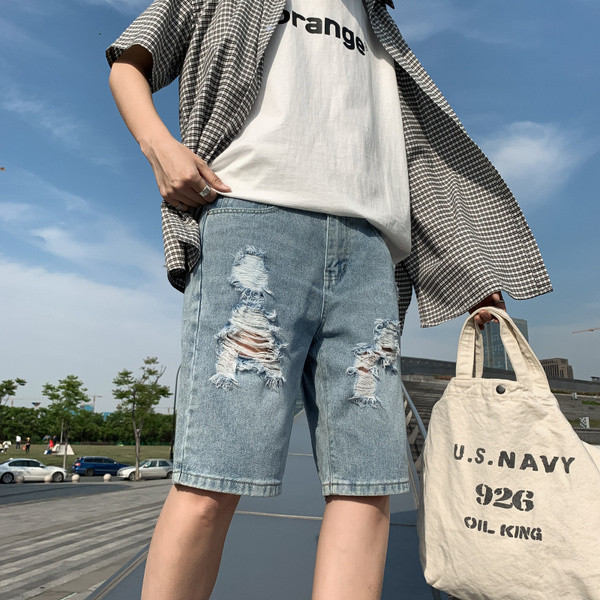 Férfi 3/4-es farmernadrág szakadt gumival és zsebekkel