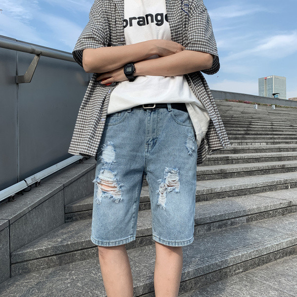 Férfi 3/4-es farmernadrág szakadt gumival és zsebekkel