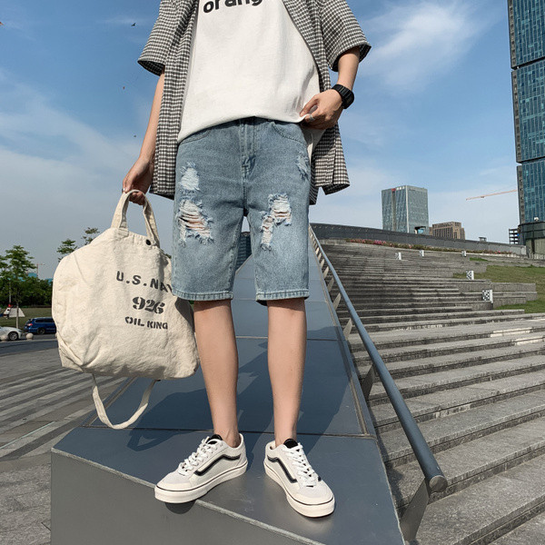 Férfi 3/4-es farmernadrág szakadt gumival és zsebekkel