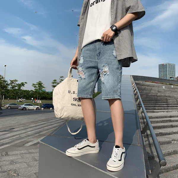 Férfi 3/4-es farmernadrág szakadt gumival és zsebekkel