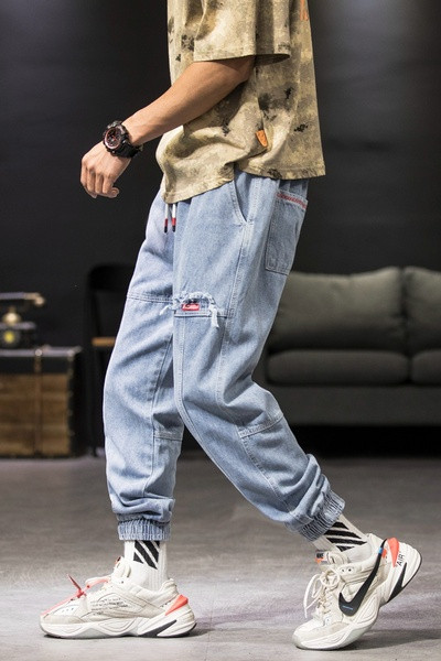 Ikdienas vīriešu džinsu plats modelis ar gumiju