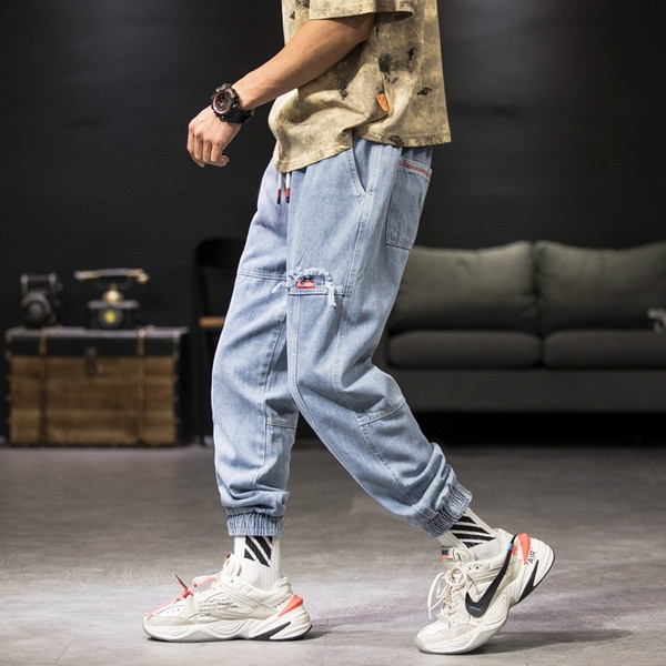 Ikdienas vīriešu džinsu plats modelis ar gumiju