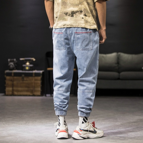 Ikdienas vīriešu džinsu plats modelis ar gumiju