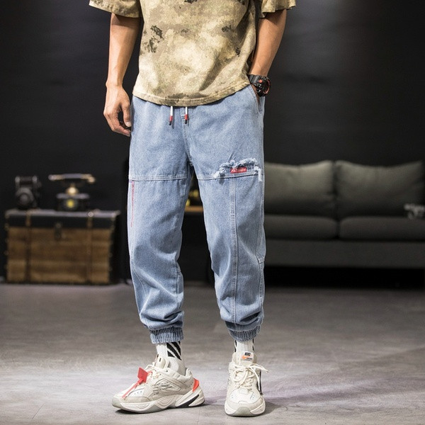 Ikdienas vīriešu džinsu plats modelis ar gumiju