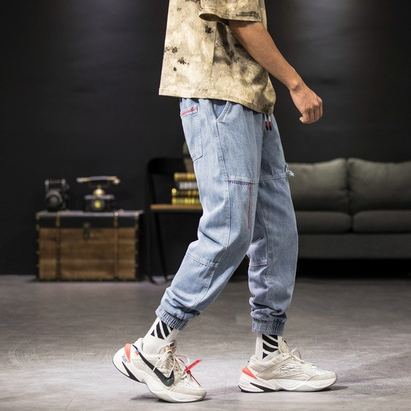 Ikdienas vīriešu džinsu plats modelis ar gumiju