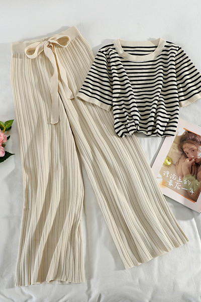 Alkalmi női szett csíkos blúzból és hosszú, nyakkendős nadrágból