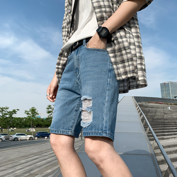 3/4-es férfi farmer, szakadt mintával, kék zsebekkel