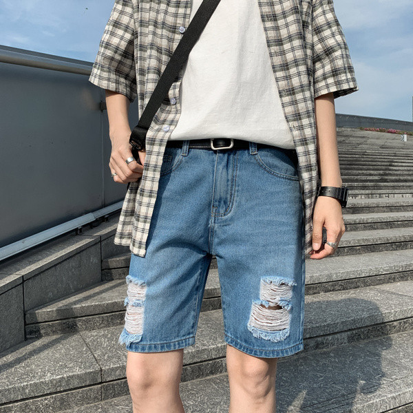 3/4-es férfi farmer, szakadt mintával, kék zsebekkel