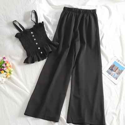 Ženski casual set s elastičnom majicom bez rukava i dugim hlačama