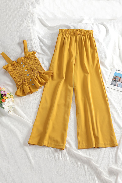 Ženski casual set s elastičnom majicom bez rukava i dugim hlačama