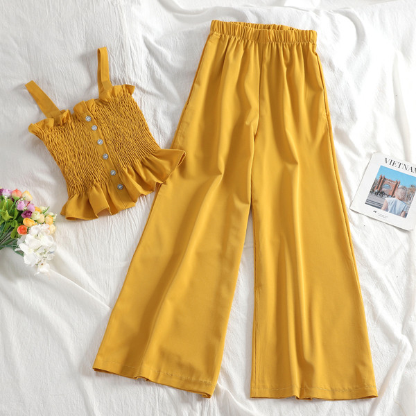 Ženski casual set s elastičnom majicom bez rukava i dugim hlačama