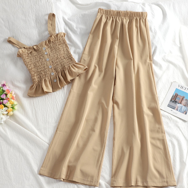 Ženski casual set s elastičnom majicom bez rukava i dugim hlačama