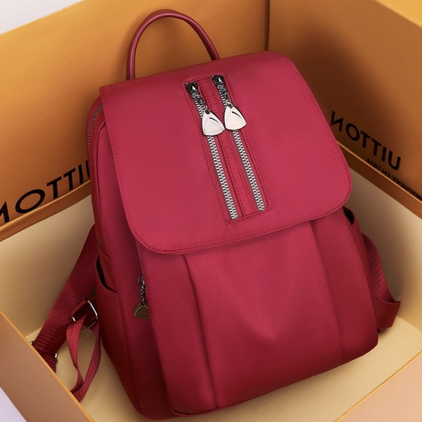 Uue mudeli naiste seljakott punase, beeži ja musta värviga