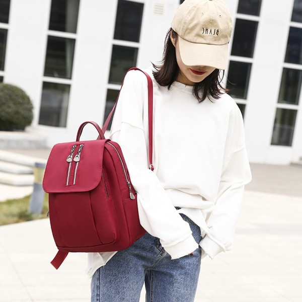 Uue mudeli naiste seljakott punase, beeži ja musta värviga