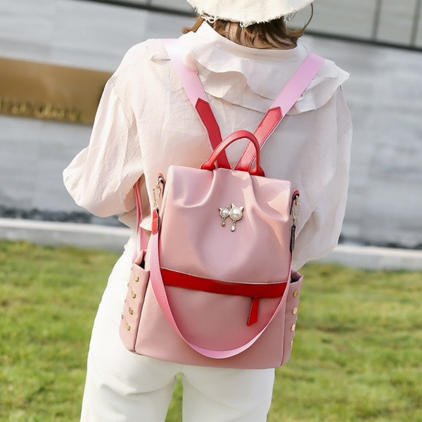 Uue mudeli metallist elementidega naiste seljakott