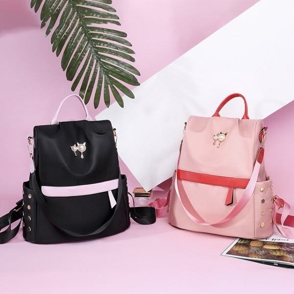 Uue mudeli metallist elementidega naiste seljakott