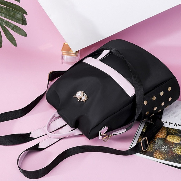 Uue mudeli metallist elementidega naiste seljakott