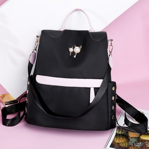 Uue mudeli metallist elementidega naiste seljakott