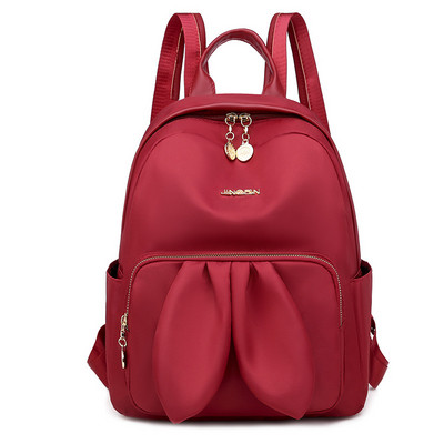 Moderan ženski ruksak s 3D elementom i prednjim džepom