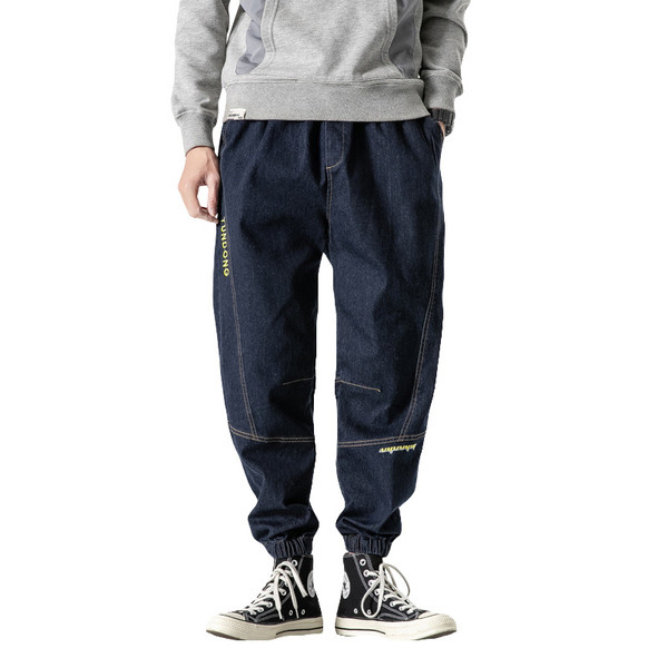 Széles farmermodell fűzővel és elasztikus derékkal