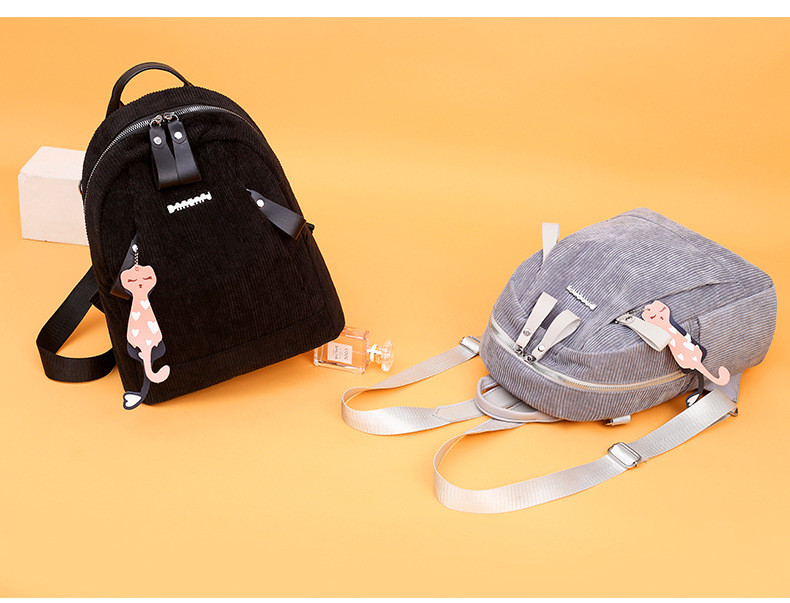 Novi model ženskog ruksaka na pruge sa prednjim džepovima