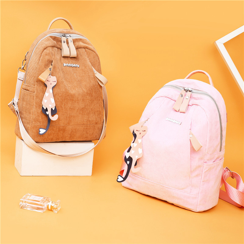 Novi model ženskog ruksaka na pruge sa prednjim džepovima