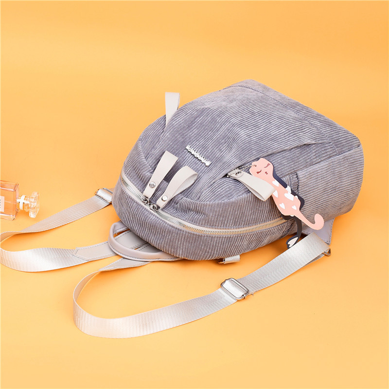 Novi model ženskog ruksaka na pruge sa prednjim džepovima