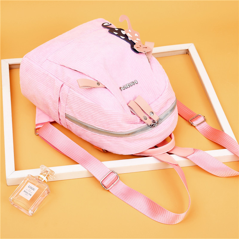 Novi model ženskog ruksaka na pruge sa prednjim džepovima