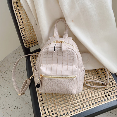 Ženski ruksak s patentnim zatvaračem i prednjim džepom