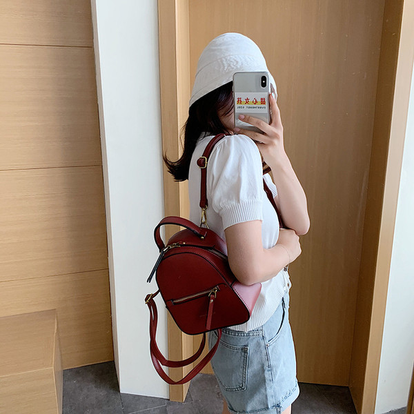 Moderan ženski kožni ruksak s patentnim zatvaračem