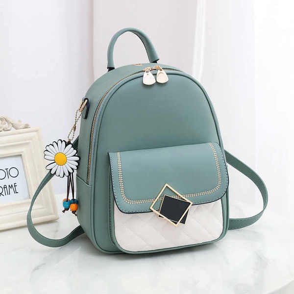 Νέο γυναικείο σακίδιο πλάτης με μεταλλική στερέωση και φερμουάρ