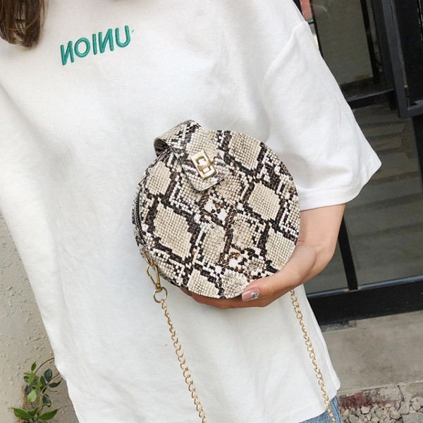 Γυναικεία τσάντα νέο μοντέλο με άνιμαλ πριντ - στρογγυλό σχήμα