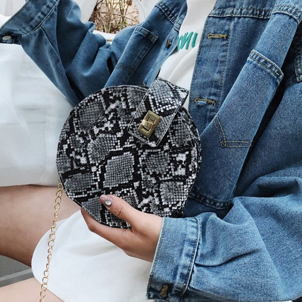 Γυναικεία τσάντα νέο μοντέλο με άνιμαλ πριντ - στρογγυλό σχήμα