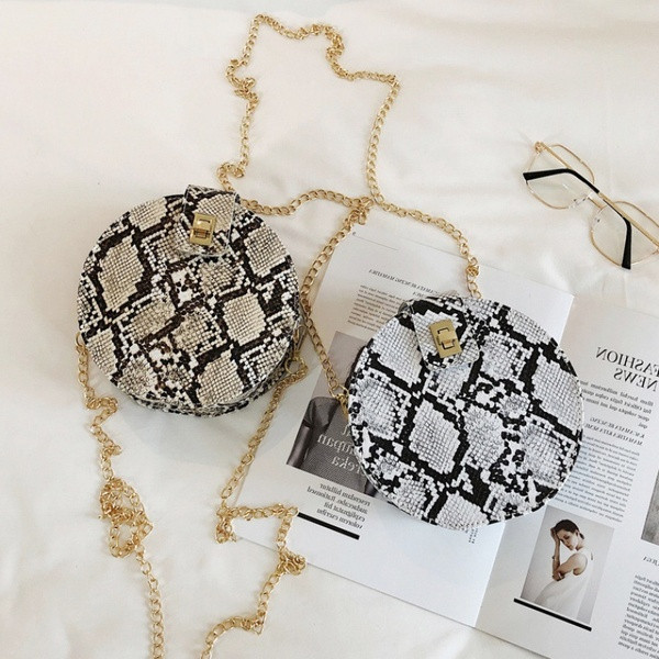 Γυναικεία τσάντα νέο μοντέλο με άνιμαλ πριντ - στρογγυλό σχήμα