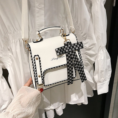 Naujo modelio moteriška dirbtinės odos kuprinė su languotu kaspinu