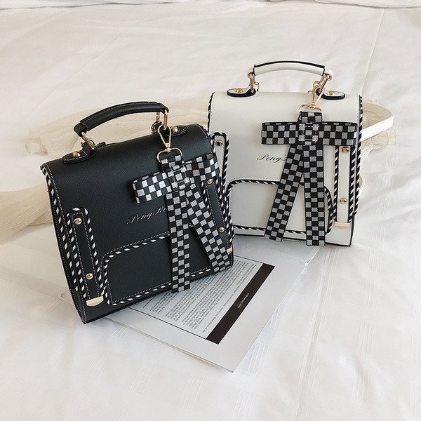 Naujo modelio moteriška dirbtinės odos kuprinė su languotu kaspinu