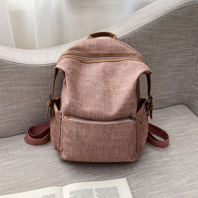 Modern női hátizsák elülső zsebbel - retro stílusú